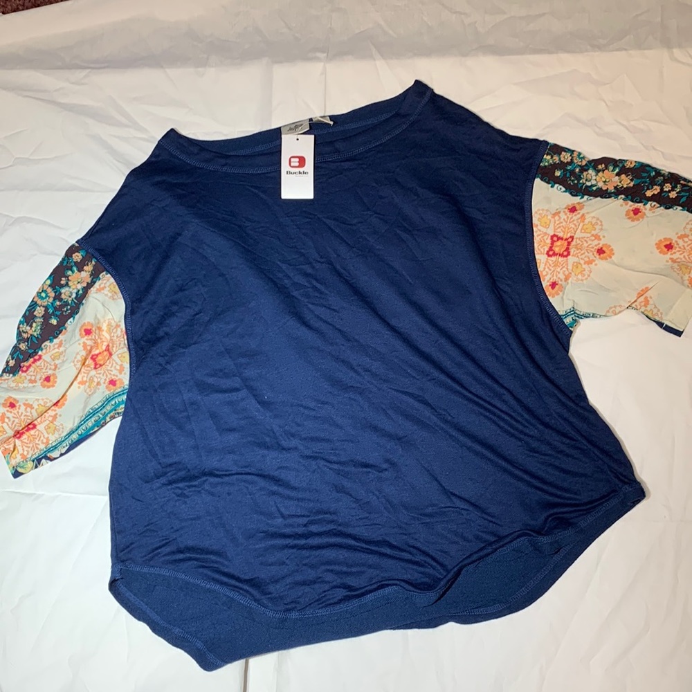Buckle top with floral sleeves